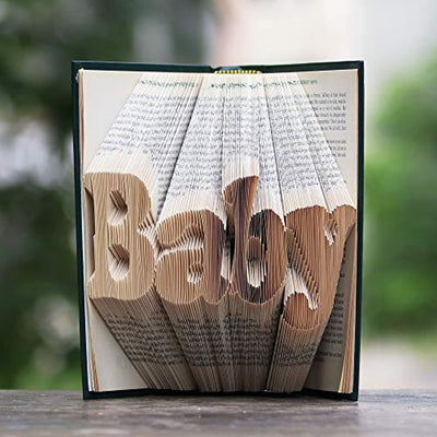 Pages of a book folded as baby