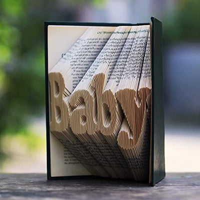 Pages of a book folded as baby