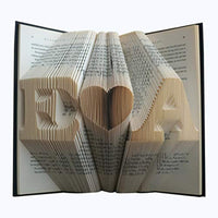Pages of a book folded as E Heart A