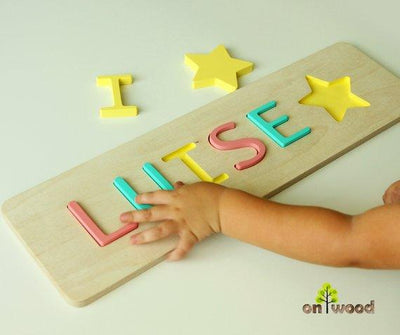 1st Christmas Gift. Personalized Baby Name Puzzle. - BOSTON CREATIVE COMPANY