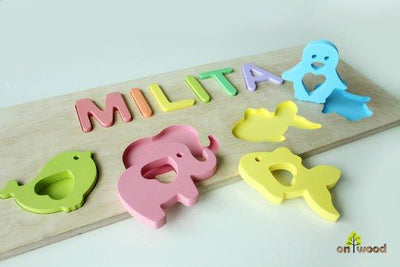Personalized Baby Girl Gift for Christmas. Wooden Name Puzzle with Bird, Elephant, Fish and Penguin shapes. - BOSTON CREATIVE COMPANY